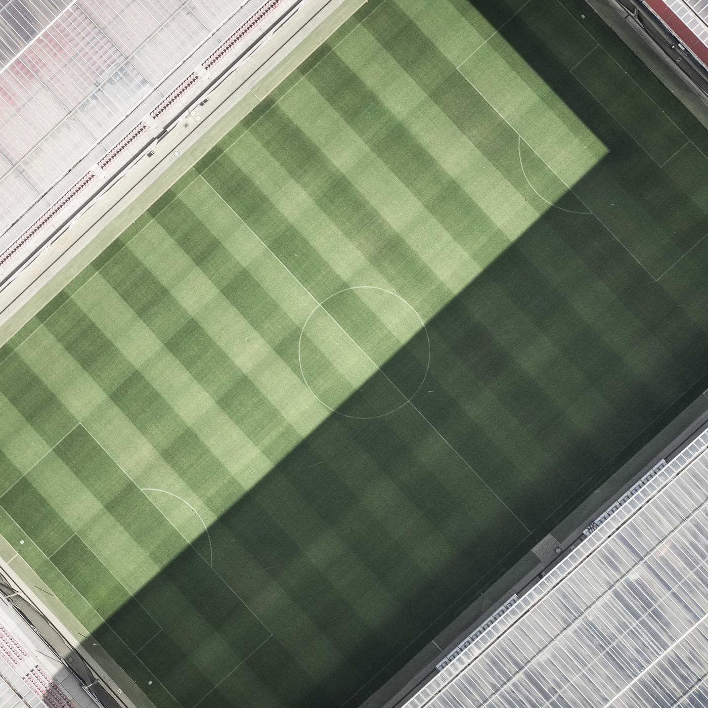 White wedding-style cake with gold leaf details